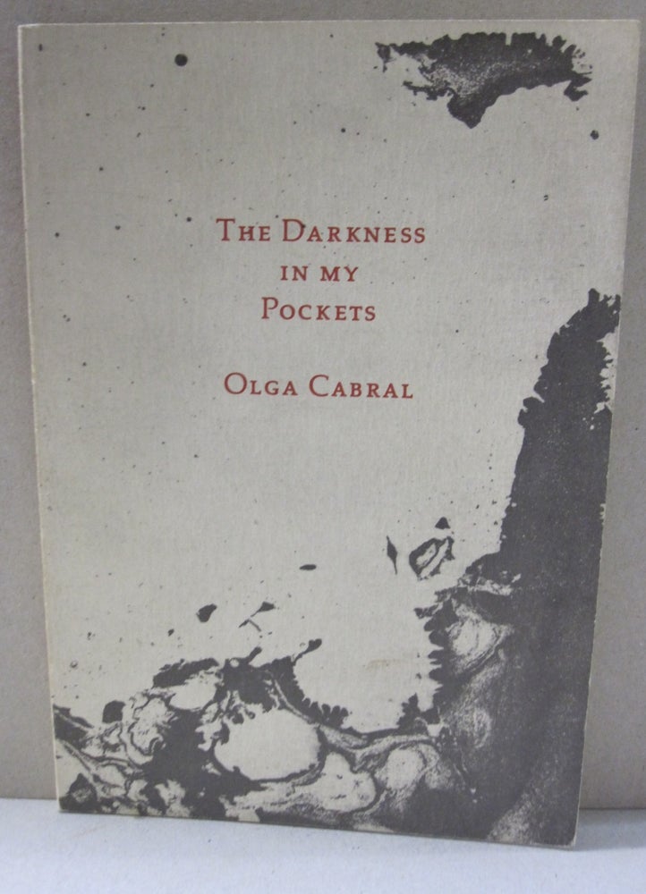 Item #50463 The Darkness in My Pockets. Olga Cabral.