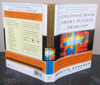 Item #76247 The Colossal Book of Short Puzzles and Problems [Signed]. Martin Gardner, Dana...
