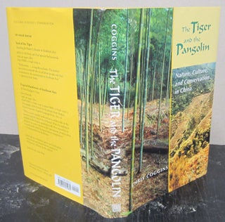 Item #76264 The Tiger and the Pangolin; Nature, Culture and Conservation in China. Chris Coggins
